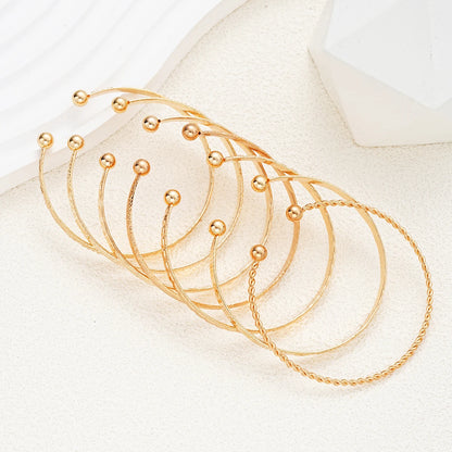 Heicobazaar™ 7 Pcs/Set Gold Color Bracelets Stainless Steel Gold Design