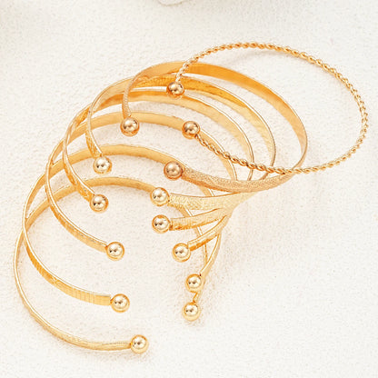 Heicobazaar™ 7 Pcs/Set Gold Color Bracelets Stainless Steel Gold Design