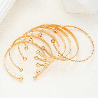 Heicobazaar™ 7 Pcs/Set Gold Color Bracelets Stainless Steel Gold Design