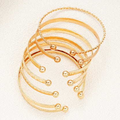 Heicobazaar™ 7 Pcs/Set Gold Color Bracelets Stainless Steel Gold Design